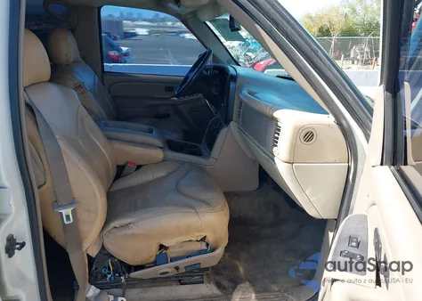 2004 Chevrolet Suburban 1500 Z71 z USA, uszkodzony, nr VIN 3GNFK16T64G111429